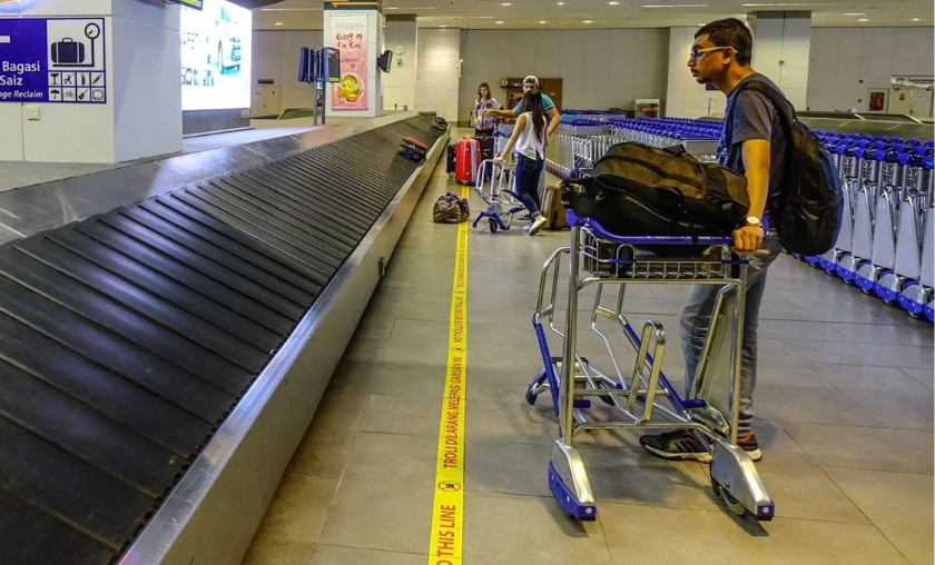 Avoiding Checked Bag Fees & Overhead Costs - thecompleteportal